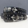 Y2K Gothic Punk Skull Studded Belt – Vintage Western Rhinestone Buckle Leather Belt with Cross & Fleur-de-Lis Metal Accents