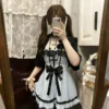 vintage gothic vintage inspired white lace cami mini dress set dark aesthetic bow cross empire waist dress with black short sleeve cardigan 2 piece set