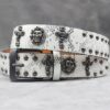 Y2K Gothic Punk Skull Studded Belt – Vintage Western Rhinestone Buckle Leather Belt with Cross & Fleur-de-Lis Metal Accents